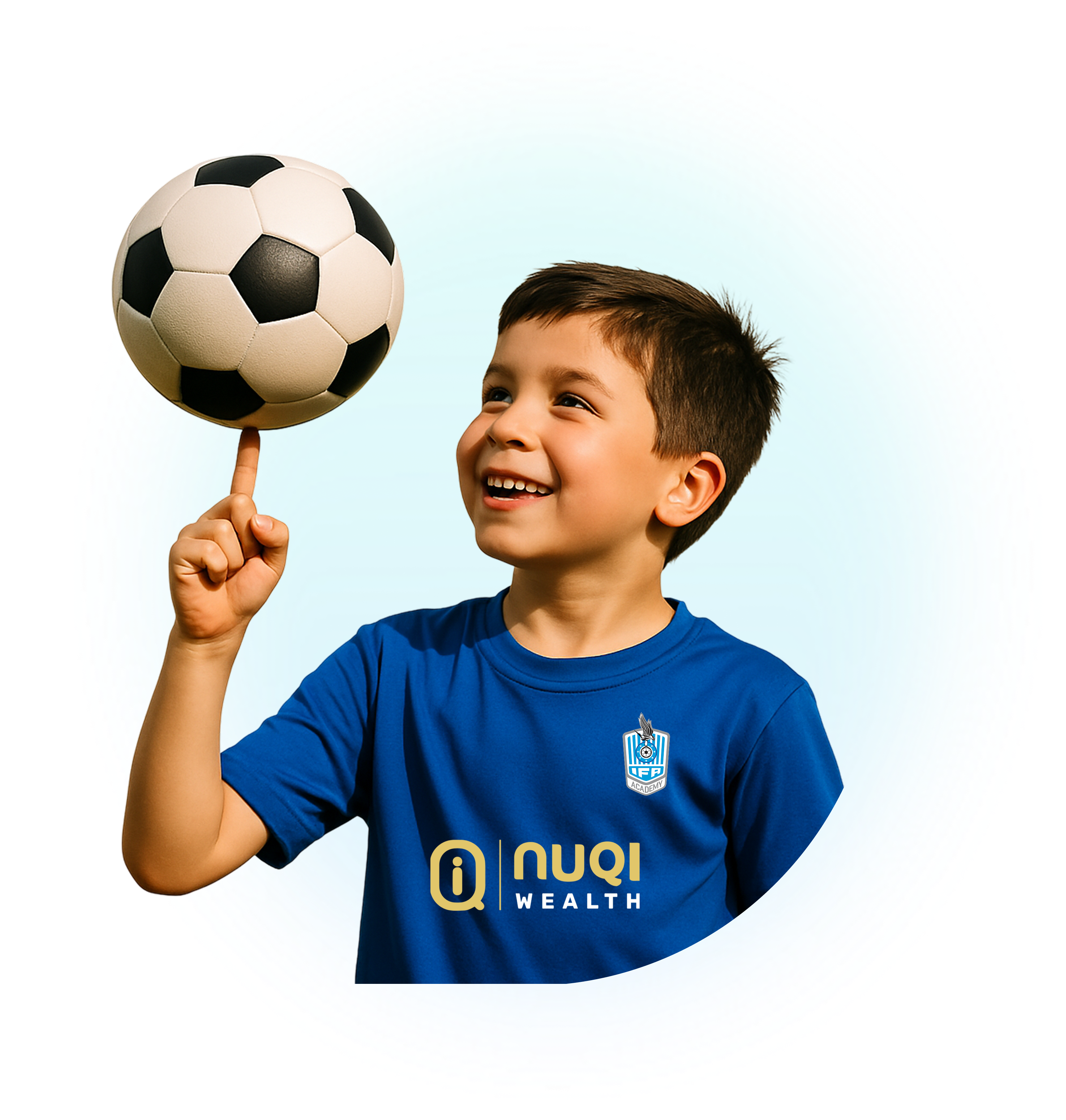 Young boy balancing football on finger