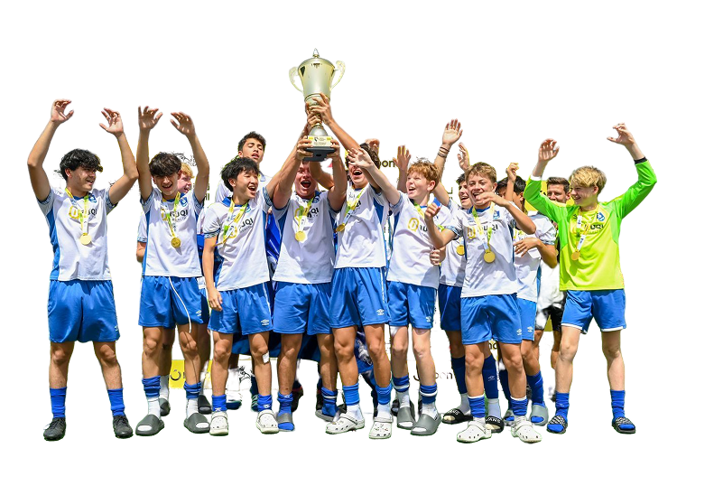 Team celebrating with trophy